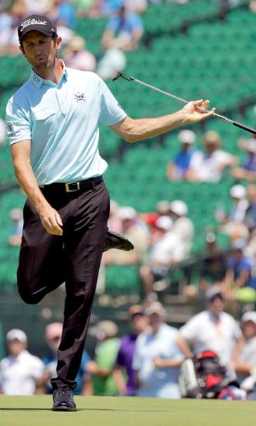 The Latest: McIlroy, Mickelson among cut casualties